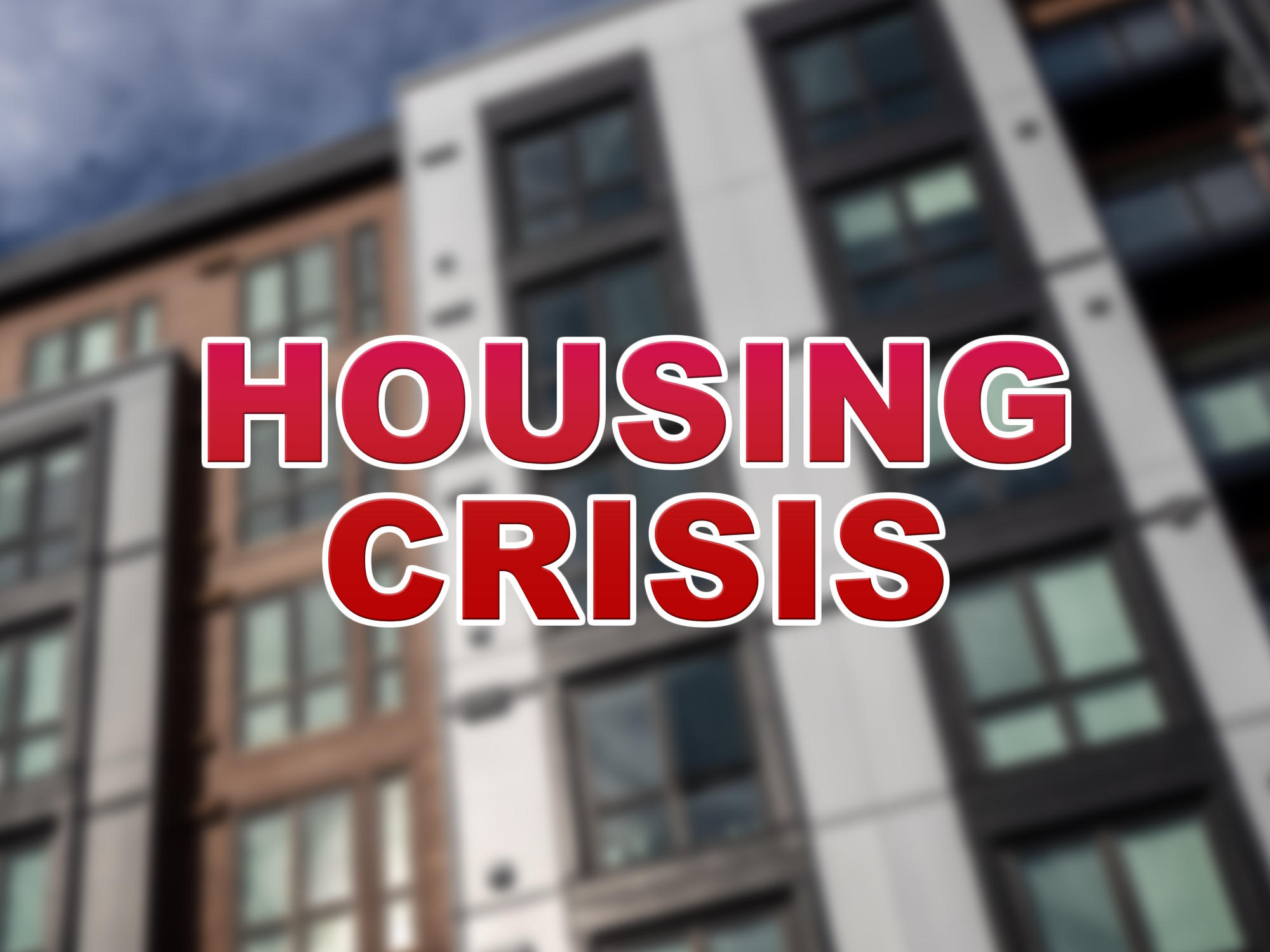 An image of a building with the words housing crisis.
