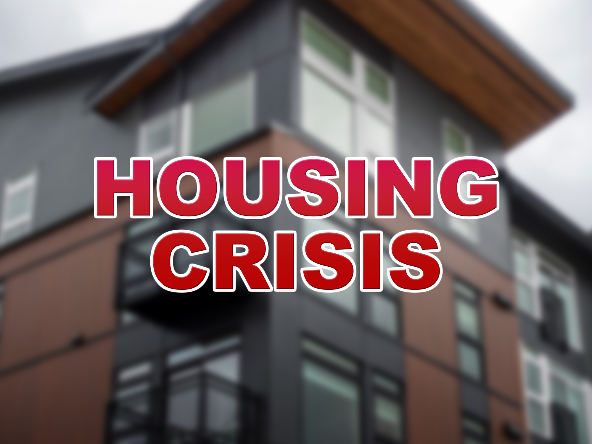 An image of a building with the words housing crisis.