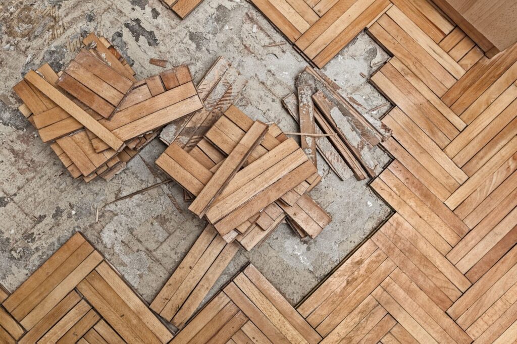 A wooden floor that has been removed from a room.
