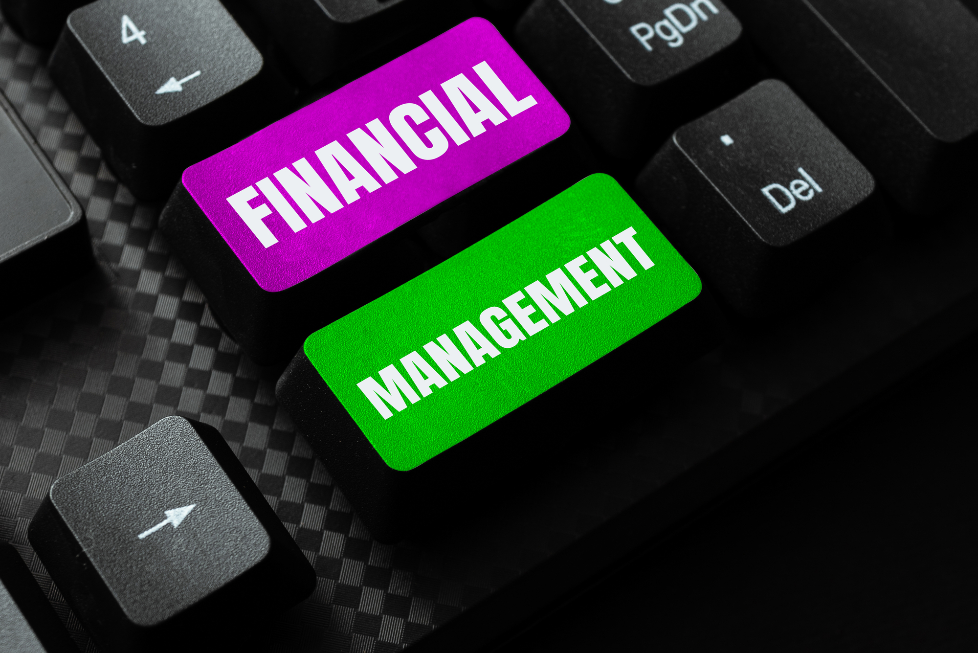 Financial and management buttons on a computer keyboard.