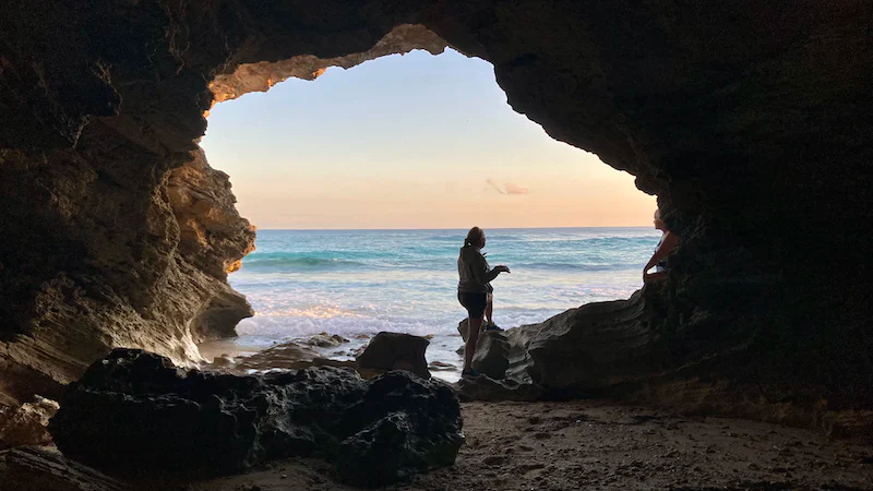 small cave with sunset by beach in Treasure Cay
