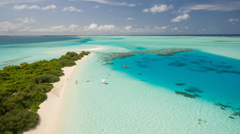 white sand sandy beaches and crystal clear water on island