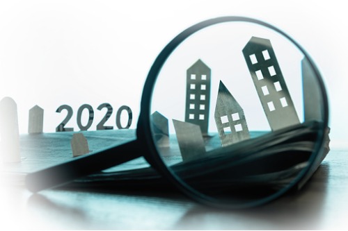 A magnifying glass with the word 2020 on it.