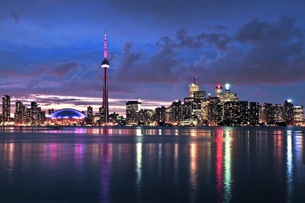 Toronto skyline at dusk with the cn tower in the background.