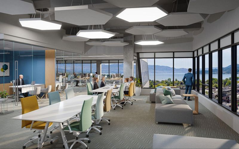 A rendering of a modern office space with large windows.