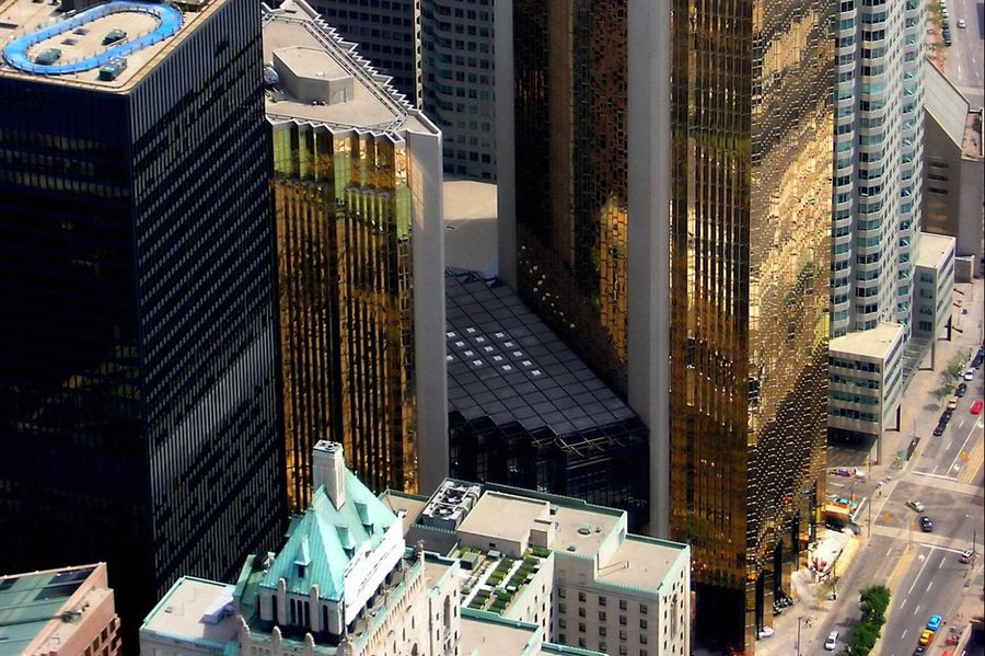 An aerial view of a city with tall buildings.