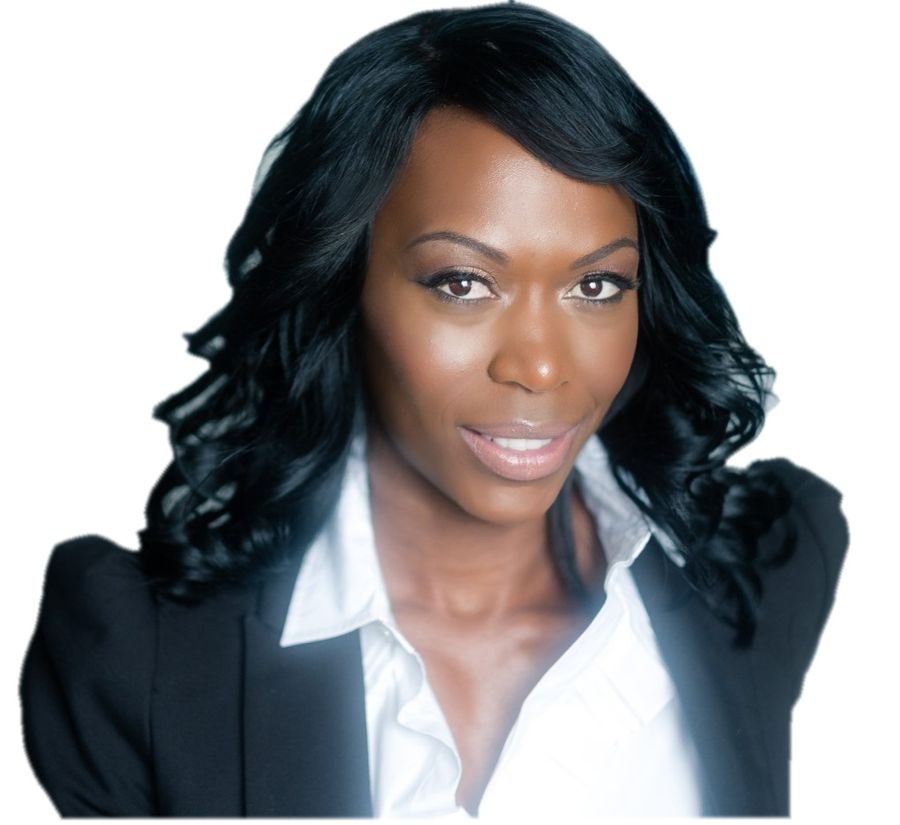 A black woman in a business suit posing for a photo.