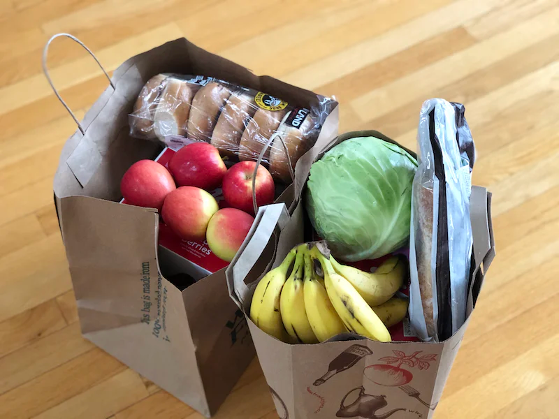 grocery bags with basic grocery items