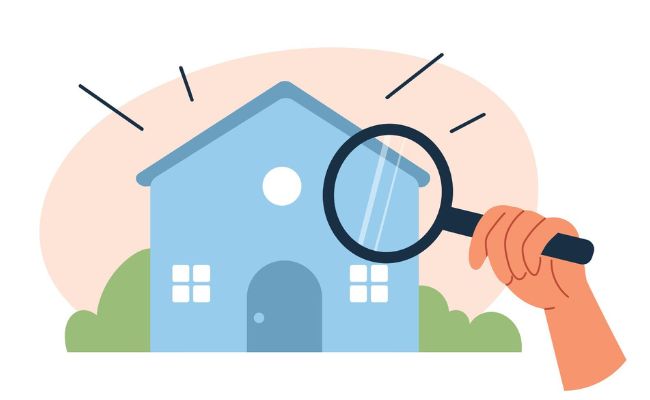 A hand holding a magnifying glass over a house.