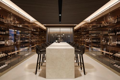 A wine cellar with a table and chairs.