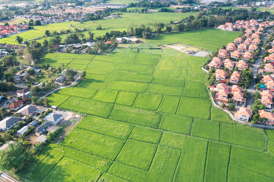 Land or landscape of green field in aerial view for sale or inve