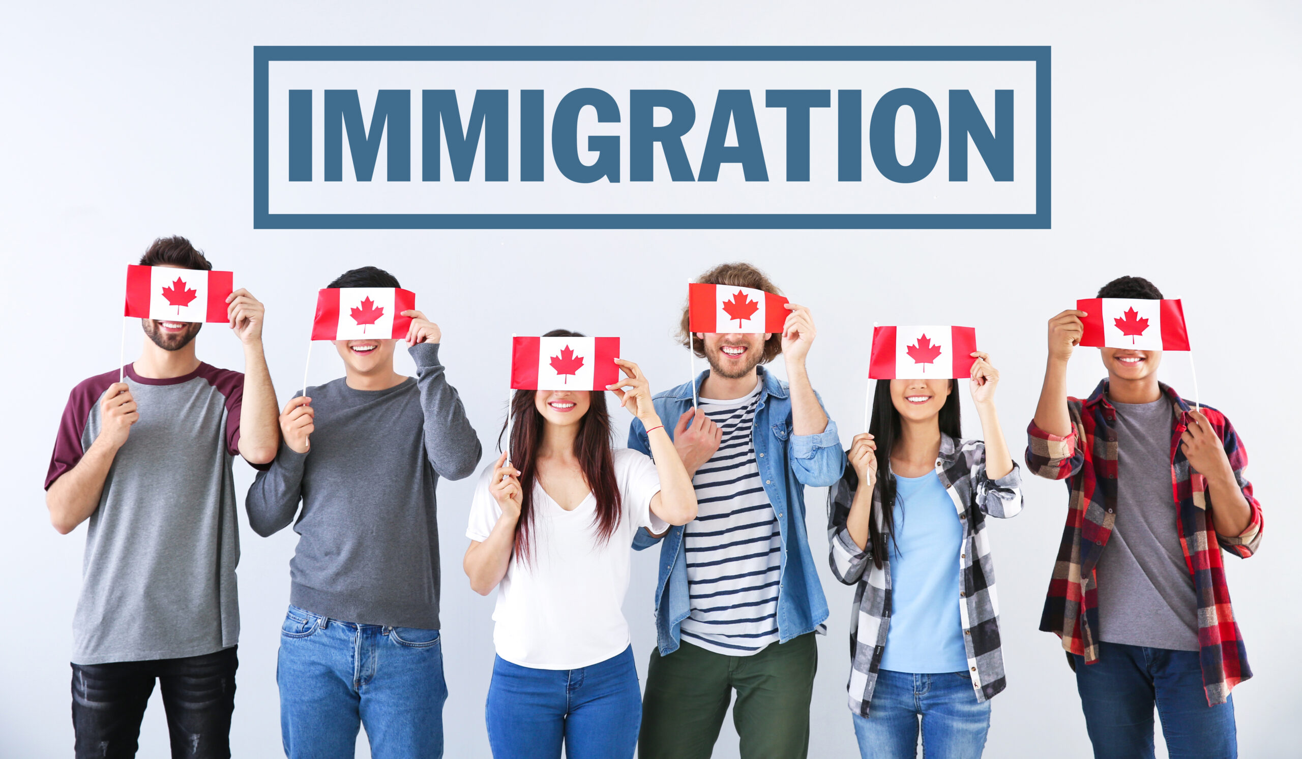Group,Of,Students,With,Canadian,Flags,And,Word,Immigration,On