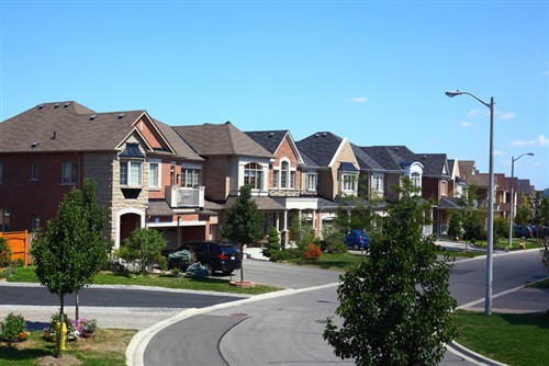 A row of houses in a suburban neighborhood.