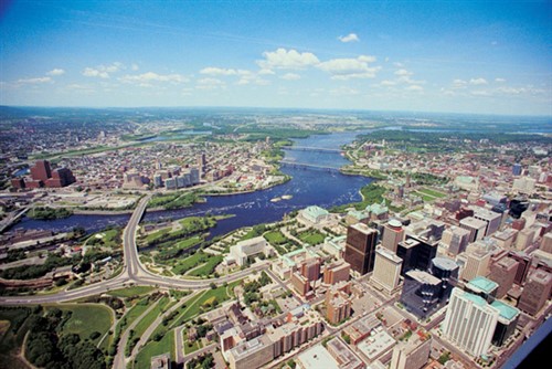 An aerial view of a city and river.