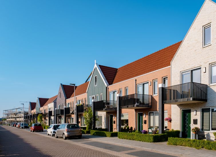 A row of townhouses on a street in the Netherlands, offering the perfect setting for remote work.