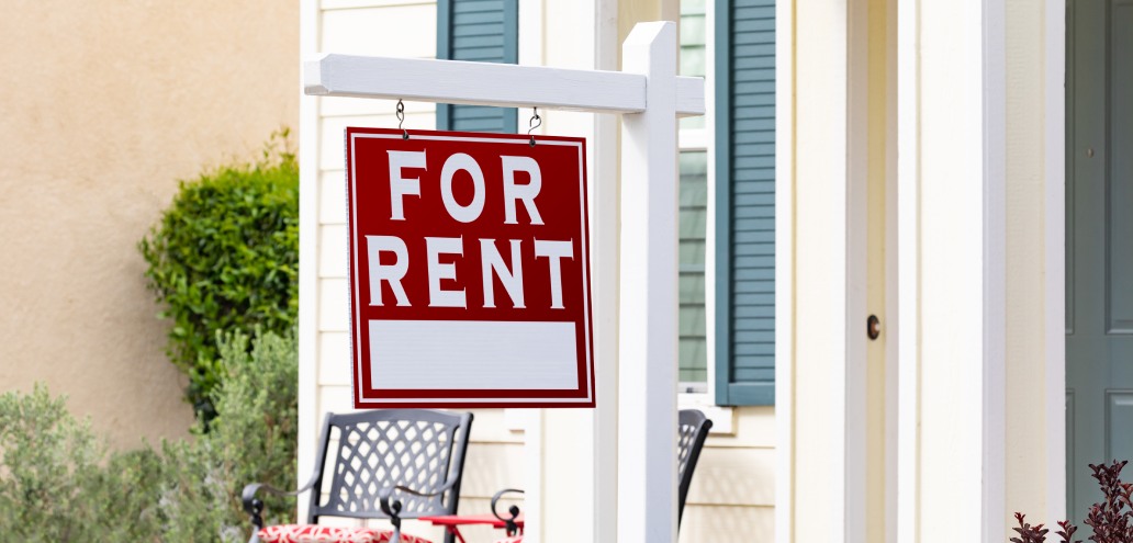 For rent" sign displayed outside a revenue residential property.